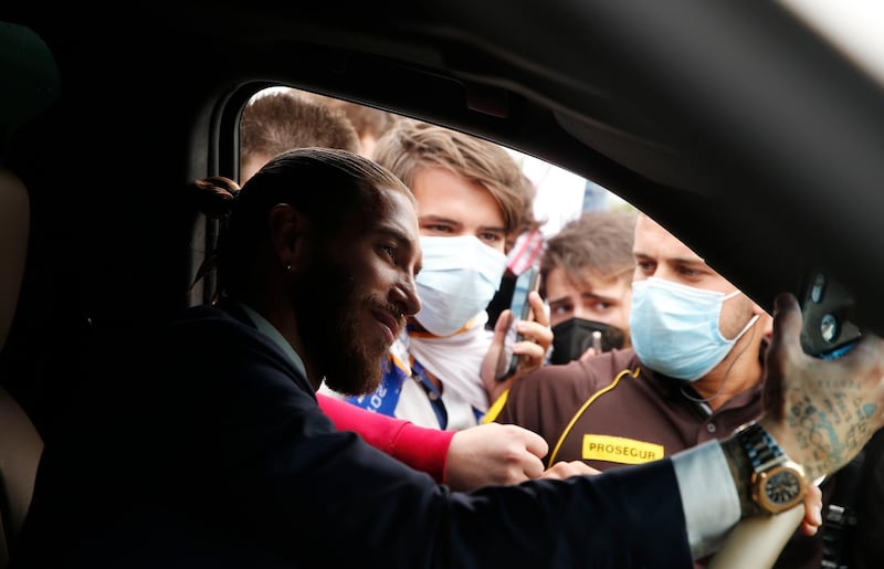 Soccer Football - Real Madrid captain Sergio Ramos leaves the club after 16 years - Ciudad Real Madrid, Valdebebas, Madrid, Spain - June 17, 2021 Real Madrid fans with Real Madrid's Sergio Ramos outside Ciudad Real Madrid, Valdebebas REUTERS/Susana Vera