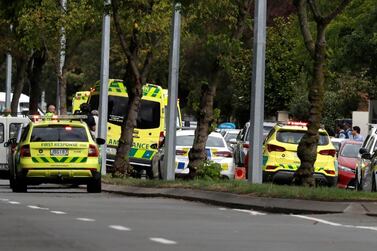 Ambulances parked outside a mosque in central Christchurch after the mass shooting that left several dead. AP Photo