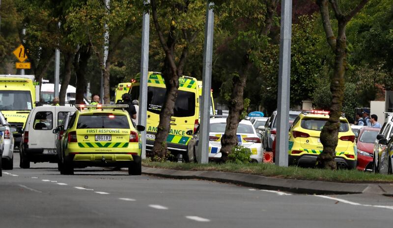 Ambulances parked outside a mosque in central Christchurch, New Zealand, Friday, March 15, 2019. Many people were killed in a mass shooting at a mosque in the New Zealand city of Christchurch on Friday, a witness said. Police have not yet described the scale of the shooting but urged people in central Christchurch to stay indoors. (AP Photo/Mark Baker)