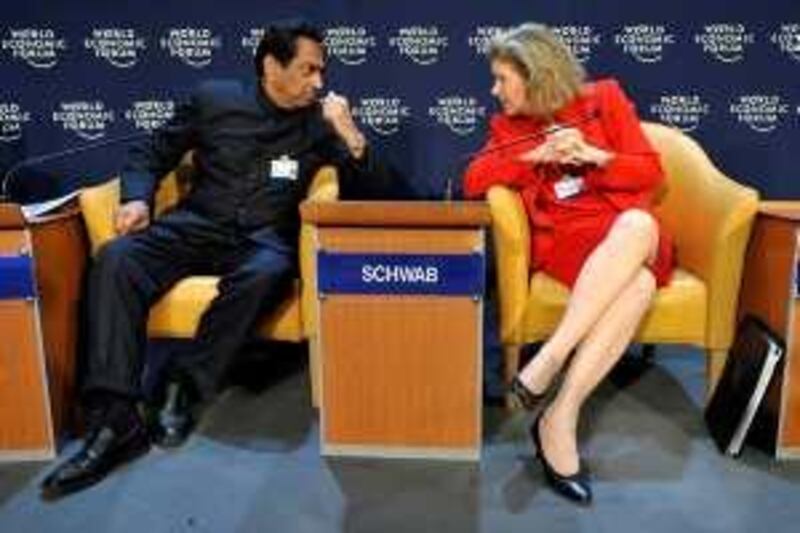 US Trade Representative Susan Schwab and Indian Minister of Commerce and Industry Kamal Nath talk during a session at the World Economic Forum in Davos 26 January 2008.   WTO members are hoping to agree on the most difficult parts of the stalled Doha round of trade talks in April, the Swiss economy minister said Saturday, raising new hopes of a breakthrough.
 AFP PHOTO FABRICE COFFRINI