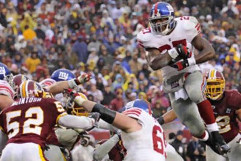 The New York Giants running back Brandon Jacobs, right with the ball, in action against the Washington Redskins last month, hopes to be fit to face the Carolina Panthers on Sunday.