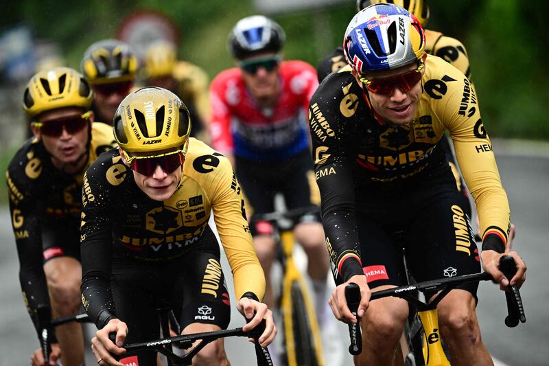 Jonas Vingegaard, left, and Wout Van Aert, right, lead a strong Jumbo-Visma team at the 2023 Tour de France. AFP
