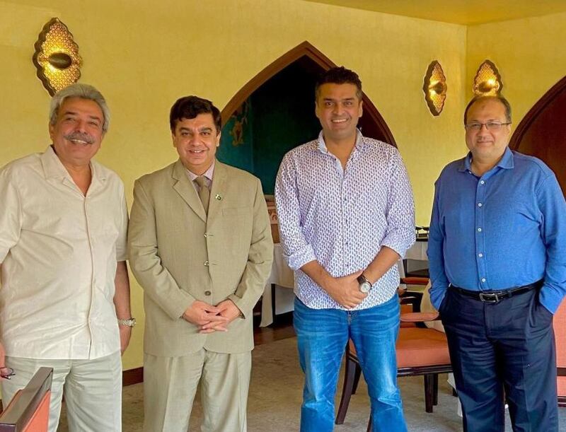 Fakhr-e-Alam with Pakistani Consul General in Dubai Ahmed Amjad (second to left). 