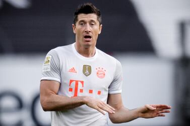 epa09026231 Bayern's Robert Lewandowski reacts during the German Bundesliga soccer match between Eintracht Frankfurt and Bayern Muenchen in Frankfurt, Germany, 20 February 2021. EPA/RONALD WITTEK / POOL CONDITIONS - ATTENTION: The DFL regulations prohibit any use of photographs as image sequences and/or quasi-video.