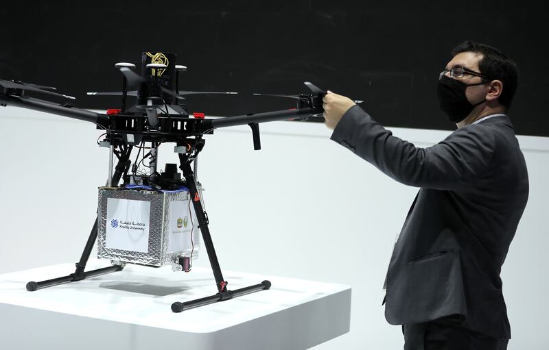 A drone delivery bot on display at the Roads and Transport Authority stand.