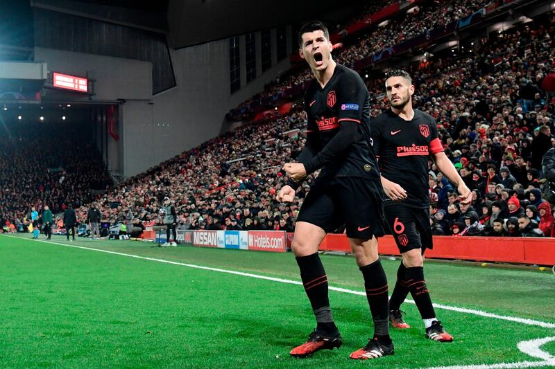 Atletico Madrid's Spanish striker Alvaro Morata celebrates scoring his side's third goal. AFP