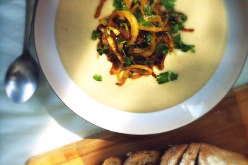 White bean soup with crispy curried onions and bread. Silvia Razgova / The National