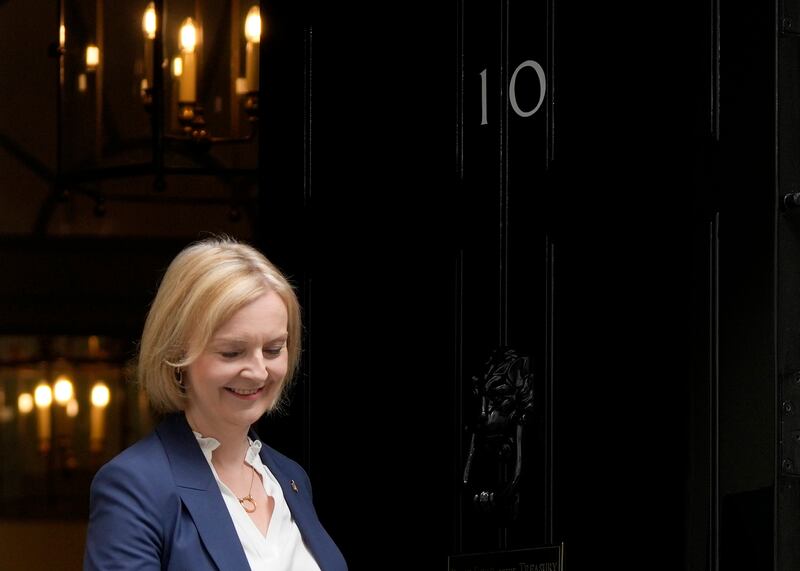 British Prime Minister Liz Truss leaves Downing Street to attend the Houses of Parliament. AP