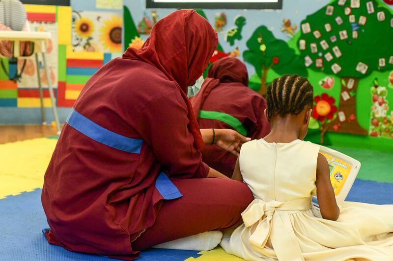 Inmates spend time with their children at the nursery.
