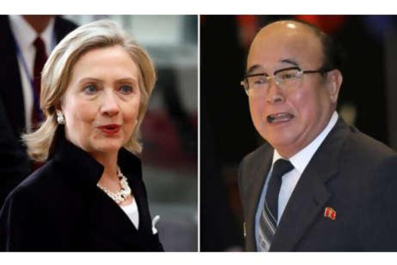 The US Secretary of State Hillary Clinton, left, the and North Korean foreign minister Pak Ui Chun.