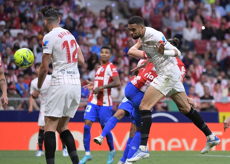 Sevilla forward Youssef En-Nesyri scores the equalising goal against Atletico Madrid. AFP