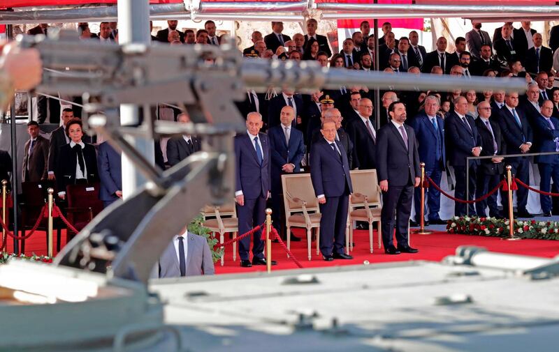 Lebanese Prime Minister Saad Hariri, centre right, President Michel Aoun, centre, and House Speaker Nabih Berri attend a military parade to celebrate the 75th anniversary of Lebanon's independence in Beirut. AFP