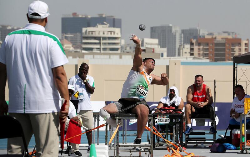 DUBAI, UNITED ARAB EMIRATES , Nov 7  – 2019 :- Bhagat Singh (IND) taking part in the men’s shot put F57 qualification during the Dubai 2019 World Para Athletics Championship held at Dubai Club For People Of Determination in Dubai. ( Pawan Singh / The National )  For New. Story by Ramola