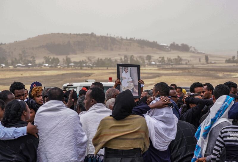 Mourners visit the crash site. Getty Images