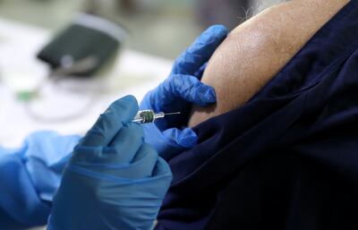 DUBAI, UNITED ARAB EMIRATES , Feb 6 – PEOPLE GETING THE FIRST DOSE OF SINOPHARM VACCINATION DURING THE VACCINATION DRIVE AT THE GURU NANAK DARBAR GURUDWARA IN DUBAI. Guru Nanak Darbar Gurudwara has partnered with Tamouh Health Care LLC, to provide on-site Sinopharm Vaccination for all residents of the UAE free of charge on 6th, 7th & 8th February 2021. (Pawan Singh / The National) For News/Online