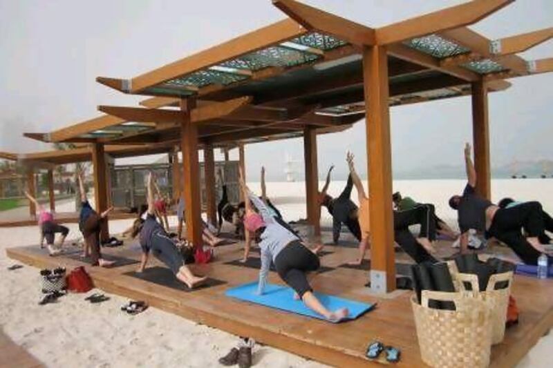 Beach yoga is a fantastic way to enjoy the outdoors and get in shape once the weather cools down.