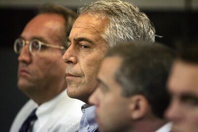 FILE - In this July 30, 2008, file photo, Jeffrey Epstein, center, appears in court in West Palm Beach, Fla.  At the center of Epstein's secluded New Mexico ranch sits a sprawling residence the financier built decades ago, complete with plans for a 4,000-square-foot (372-square-meter) courtyard, a living room roughly the size of the average American home and a nearby private airplane runway. 
Known as the Zorro Ranch, the high-desert property is now tied to an investigation that the state attorney general's office says it has opened into Epstein with plans to forward findings to federal authorities in New York.  (Uma Sanghvi/Palm Beach Post via AP, File)