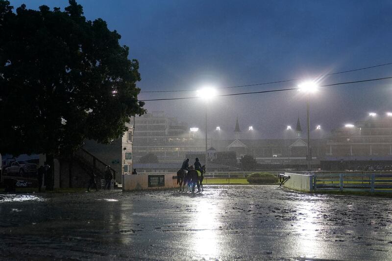 Kentucky Derby entry Tiz the Law is lead to the track for a workout at Churchill Downs in Louisville two days before the Kentucky Derby, on Thursday, September 3. AP