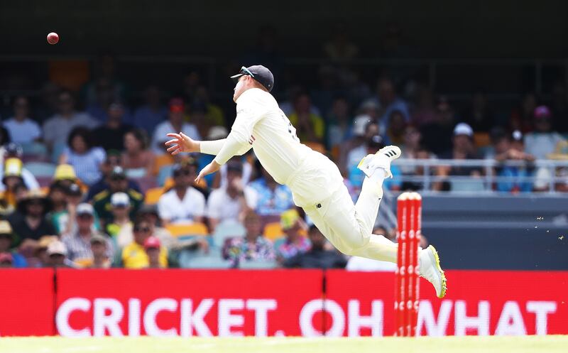 England's Ollie Pope dives to attempt to catch Marnus Labuschagne. PA