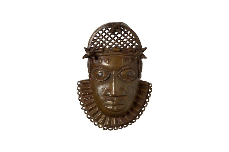 A mask, part of the Benin Bronzes to be returned to Nigeria. PA