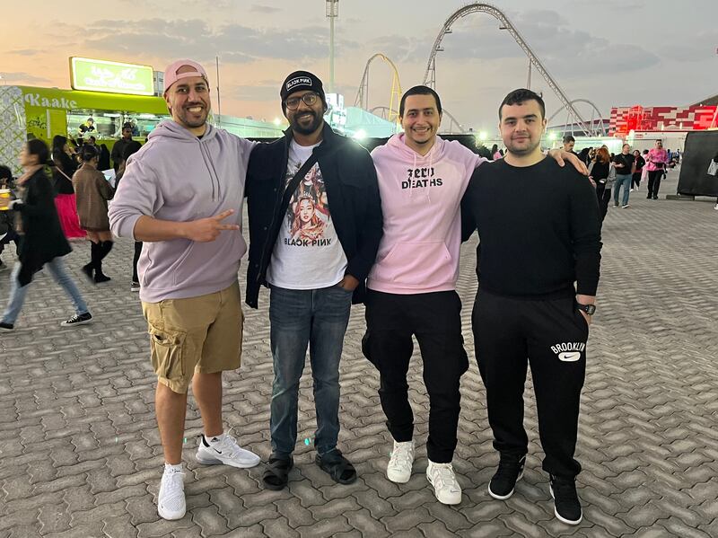Mohamed AlAli, second from right, and Mahmood Alani, right, with friends Adnan and Khalid at the Blackpink concert in Etihad Arena. Evelyn Lau / The National