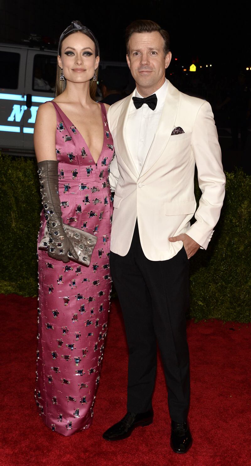 Olivia Wilde, in Prada, and Jason Sudeikis arrive for the 2015 Met Gala held at the Metropolitan Museum of Art in New York City on May 4, 2015.