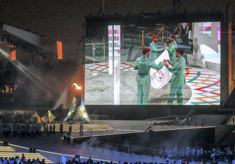 Abu Dhabi, March 21, 2019.  Special Olympics World Games Abu Dhabi 2019.  Bringing down the flag. Victor Besa/The National