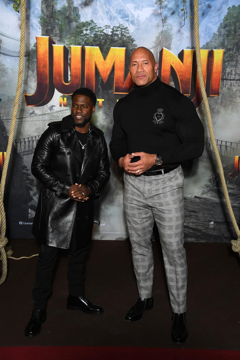 PARIS, FRANCE - DECEMBER 03: Kevin Hart and Dwayne Johnson attend the photocall of  "Jumanji : Next Level" film at le Grand Rex on December 03, 2019 in Paris, France. (Photo by Pascal Le Segretain/Getty Images)
