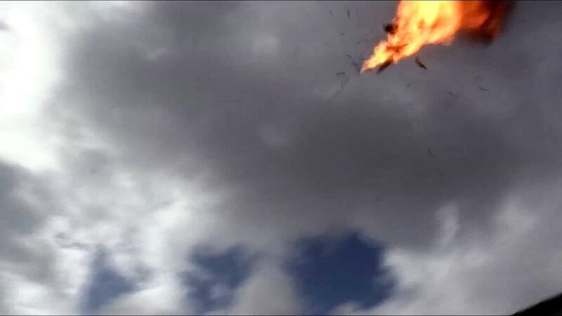 An image grab taken from a video obtained by AFPTV shows the moment a drone exploded above Yemen's al-Anad airbase in in the government-held southern province of Lahj on January 10, 2019. Six soldiers were killed in a rebel drone attack on Yemen's largest airbase, hospital sources told AFP. Another 12 people were wounded in the attack on the airbase, medics said. / AFP / AFPTV / Nabil HASAN
