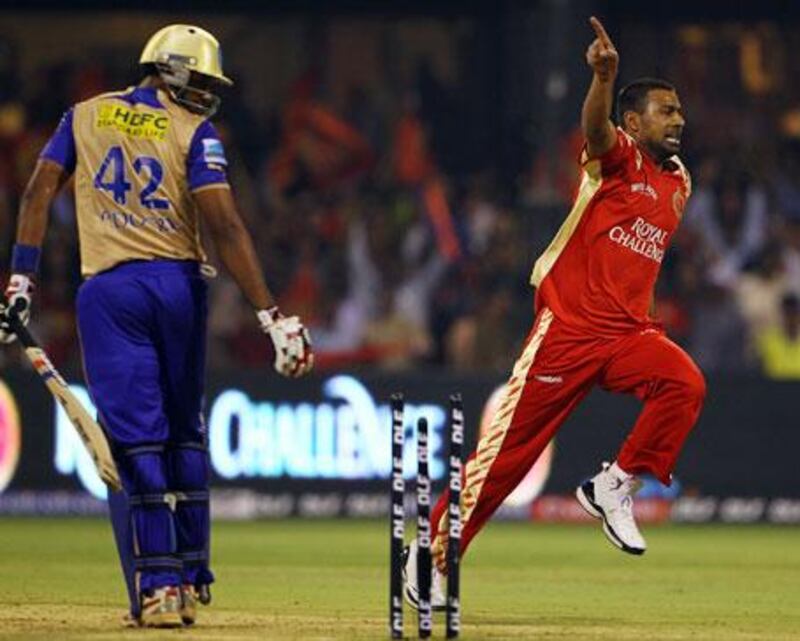 Praveen Kumar celebrates after bowling Paras Dogra to complete a hat-trick.