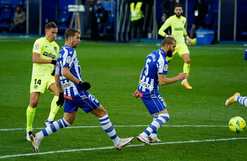 Marcos Llorente scores Atletico's first goal. Reuters