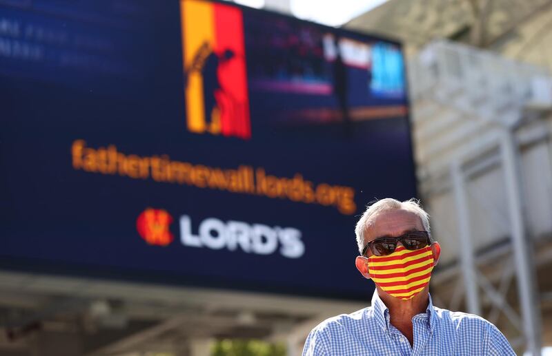 An MCC member is seen wearing a protective mask prior to the first day of the first Test between England and New Zealand at Lord's. Getty