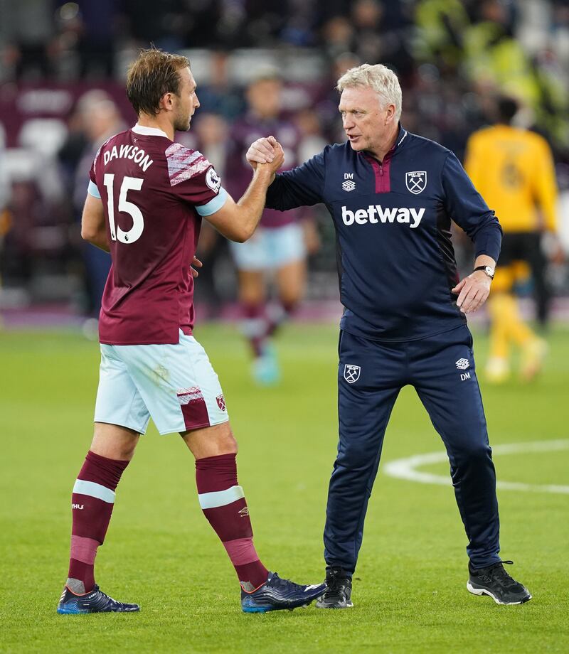 West Ham's Craig Dawson and manager David Moyes shake hands after the final whistle. PA