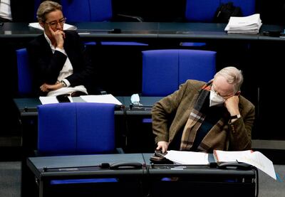 epa09093553 Alternative for Germany (AfD) faction co-leader Alexander Gauland (R) and Alternative for Germany party (AfD) faction co-chairwoman in the German parliament Bundestag and deputy chairwoman Alice Weidel  during session of the German Bundestag in Berlin, Germany, 24 March 2021. The German government tak​es questions from deputies in a one-hour government questioning.  EPA/FILIP SINGER