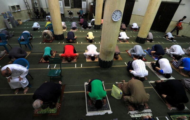 Egyptians attend the Fajr prayer inside the Al Rahman Mosque in the Cairo's Maadi neighbourhood.  Reuters