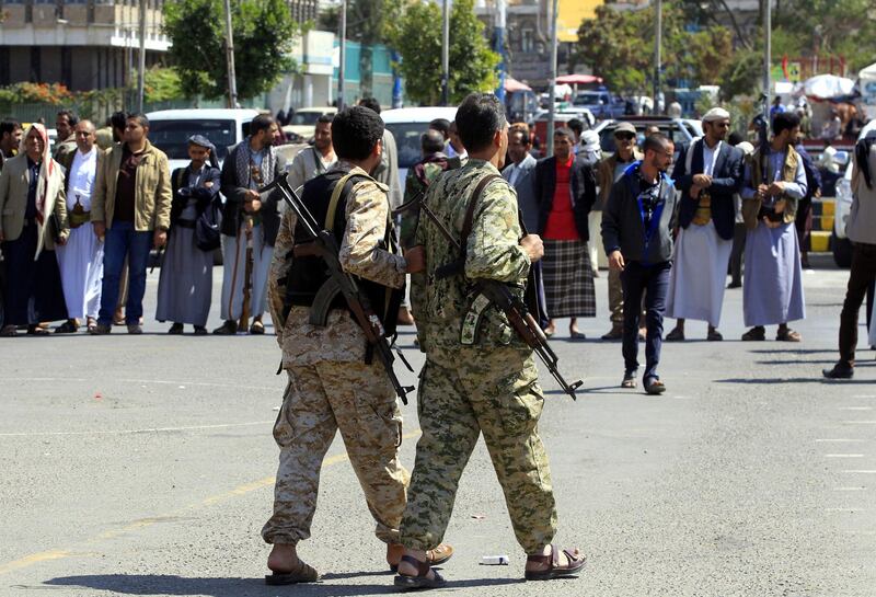 epa07073700 Houthi militiamen stand guard during a rally calling for the end of deteriorating economic crisis in Sanaâ€™a, Yemen, 06 October 2018.  According to reports, the United Nations has warned that four million Yemenis would face pre-hunger if the Arab countryâ€™s deteriorating economic crisis persists and the collapse of local currency exacerbates the threat of starvation faced by millions of Yemeni citizens.  EPA/YAHYA ARHAB