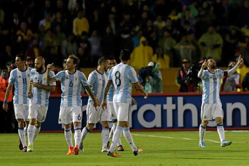 Lionel Messi, right, celebrates after scoring against Ecuador. AP Photo