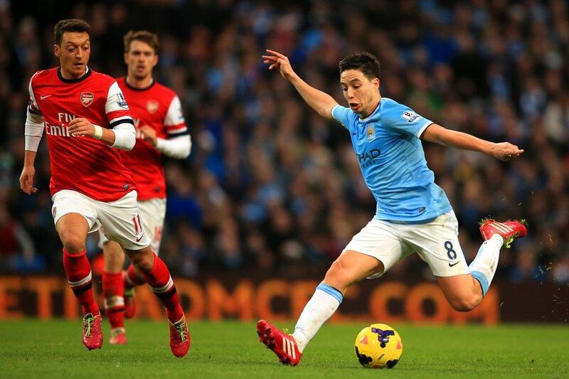 Left midfield: Samir Nasri, Manchester City. Maintained his fine form as his former club Arsenal were put to the sword at Etihad Stadium. Richard Heathcote / Getty Images