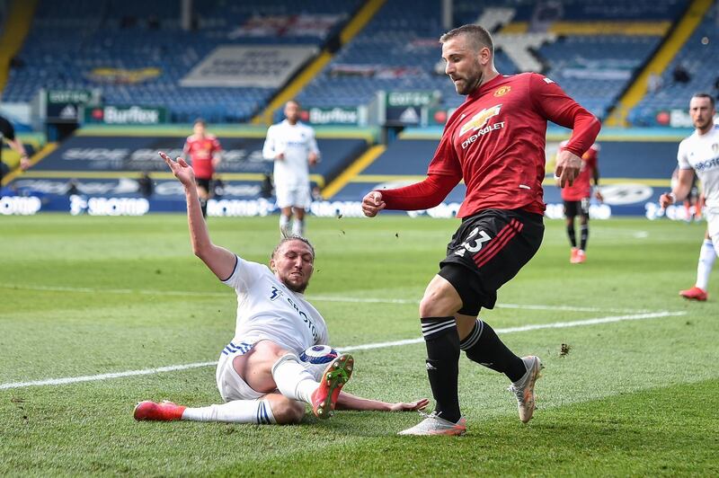 Luke Ayling of Leeds tackles Luke Shaw of Manchester United. EPA