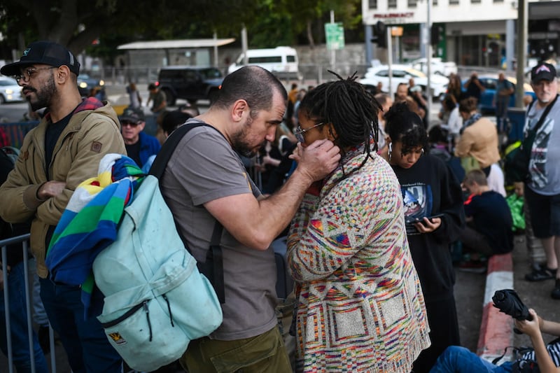 US citizens wait at the port of Haifa to be evacuated to Cyprus, amid the battle between Israel and Hamas. AFP