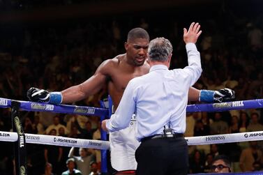 The referee waves off the fight against Andy Ruiz Jr, succumbing Anthony Joshua to his first professional defeat. AP Photo