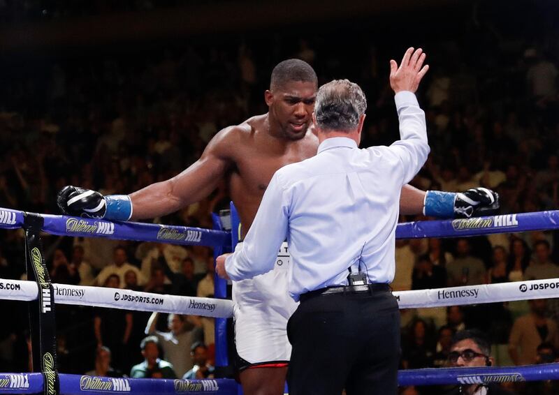 Anthony Joshua stands in the corner after the referee stopped oshua's heavyweight championship boxing match against Andy Ruiz on Saturday, June 1, 2019, in New York. Ruiz won the bout. (AP Photo/Frank Franklin II)