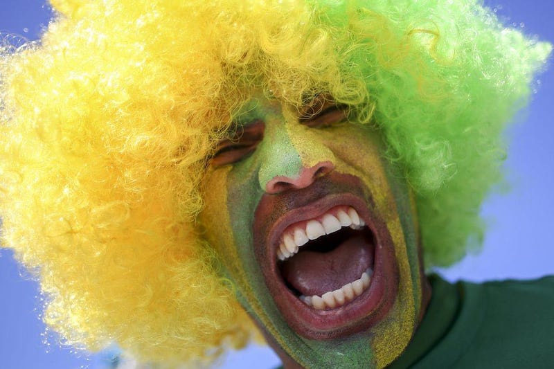 A Brazil fan is shown at Thursday's World Cup 2014 opener between Brazil and Croatia. Diego Azubel / EPA