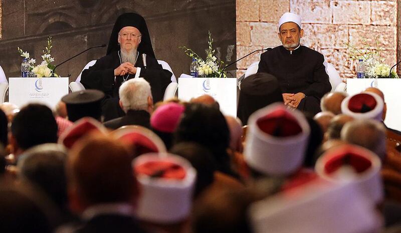 The Grand Imam of Al Azhar, Ahmed Al Tayyeb, right, and the Archbishop of Constantinople, Patriarch Bartholomew I, at the opening of the Al Azhar International Peace Conference in Cairo. Khaled Elfiqi / EPA