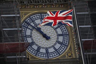 A British Union flag, also known as a Union Jack, flies in front of the clock face on the Elizabeth Tower, also known as Big Ben, of the Houses of Parliament in the Westminster district of London, U.K., on Wednesday, Aug. 28, 2019. U.K. Prime Minister Boris Johnson said he plans to suspend Parliament for almost five weeks ahead of Brexit, setting up a showdown with lawmakers who want to block him from taking the U.K. out of the European Union without a divorce deal. Photographer: Simon Dawson/Bloomberg