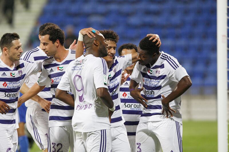 Dubai, United Arab Emirates, Dec 16 2012, Al-Maktoum Stadium Dubai, Al nasr v Al Ain-  (right) Al Ain's#3 Asamoah Gyan celebrates his goal at Al-Maktoum Stadium in Dubai. Mike Young / The National?