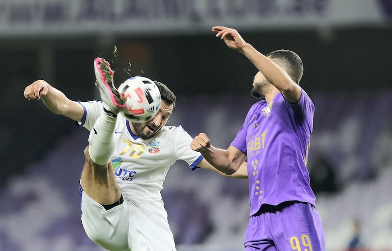 Al Ain, United Arab Emirates - Reporter: John McAuley: Jamal Maroof of Al Ain battles with Murod Khalmukhamedov of Bunyodkor. Al Ain take on Bunyodkor in the play-off to game qualify for the 2020 Asian Champions League. Tuesday, January 28th, 2020. Hazza bin Zayed Stadium, Al Ain. Chris Whiteoak / The National
