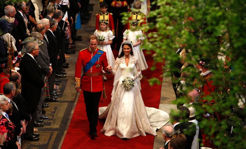 LONDON, ENGLAND - APRIL 29: Prince William, Duke of Cambridge and his new bride Catherine, Duchess of Cambridge walk down the aisle at the close of their wedding ceremony at Westminster Abbey on April 29, 2011 in London, England. The marriage of Prince William, the second in line to the British throne, to Catherine Middleton is being held in London today. The Archbishop of Canterbury conducted the service which was attended by 1900 guests, including foreign Royal family members and heads of state. Thousands of well-wishers from around the world have also flocked to London to witness the spectacle and pageantry of the Royal Wedding and street parties are being held throughout the UK. (Photo by Richard Pohle-WPA Pool/Getty Images)