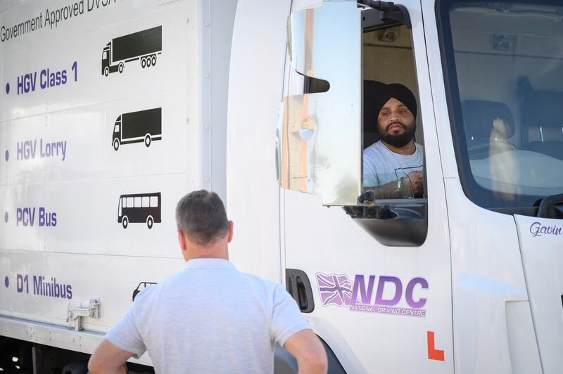 A man takes part in a driving lesson at the NDC heavy goods vehicle training centre on September 22, 2021 in Croydon, England. The combined forces of Brexit and Covid-19 created a severe shortage of HGV drivers in the UK. Getty Images