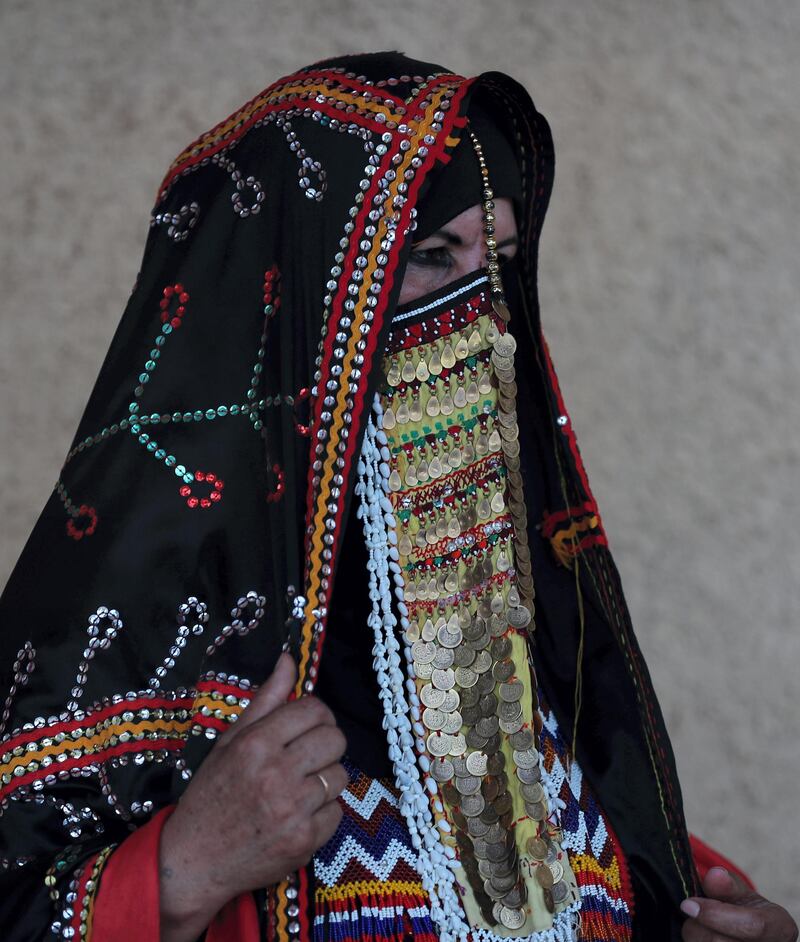 A Bedouin woman sells handicrafts and souvenirs at Ras Mohamed national park , South Sinai, near Sharm El-Sheikh, Egypt.  EPA